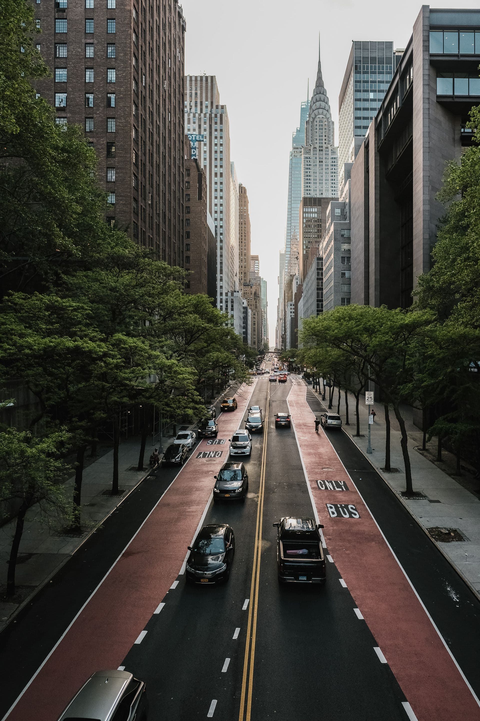 Manhattan, New York street with skyscrapers including the Chrysler Building