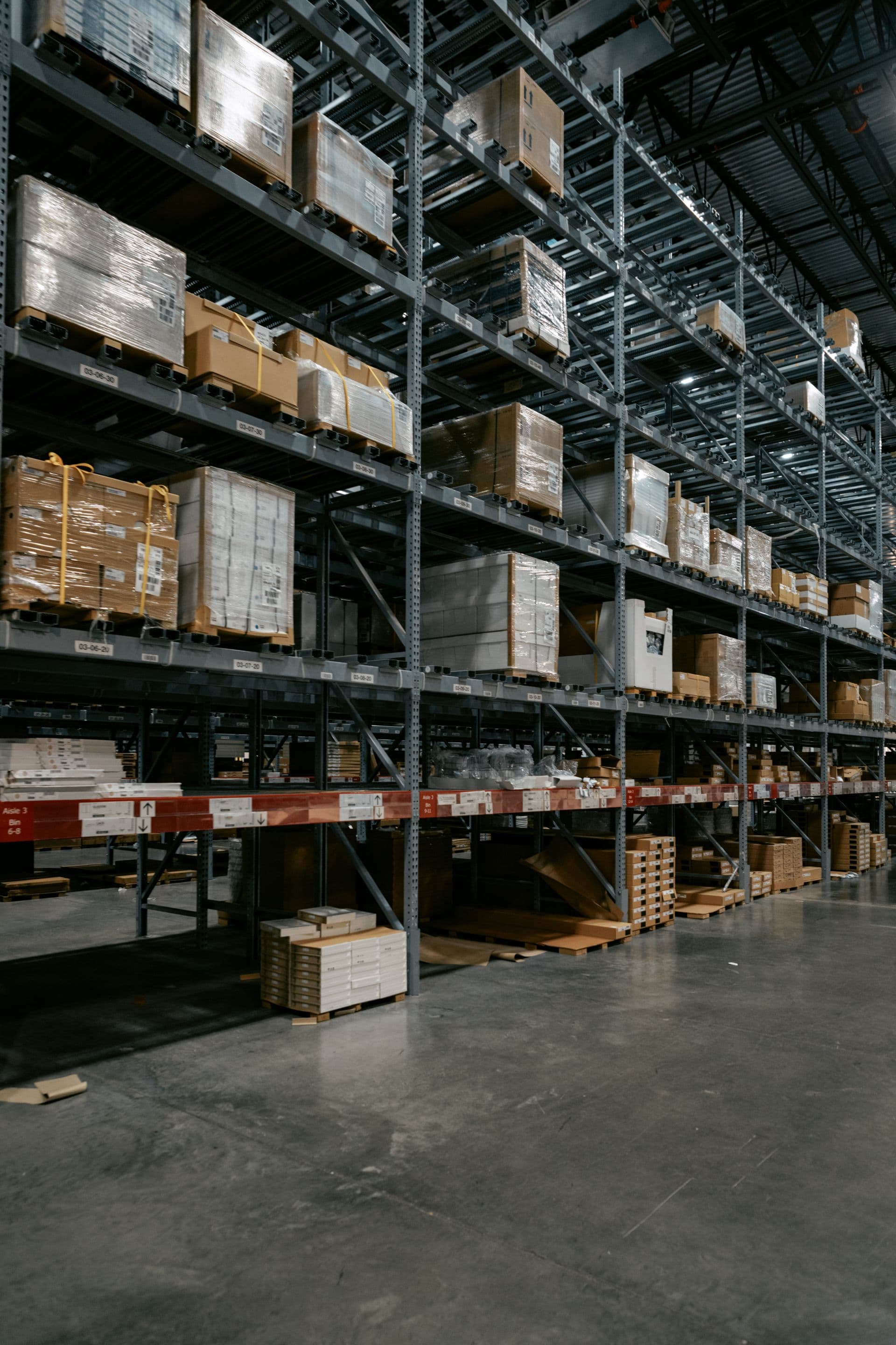 Warehouse shelving stocked with equipment inventory